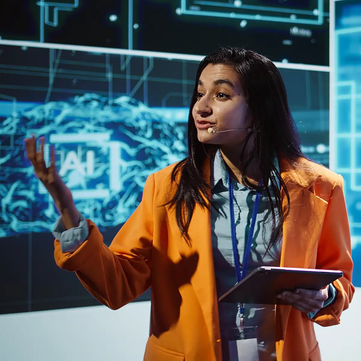 public-speaker-doing-presentation-tech-forum-event-SQ